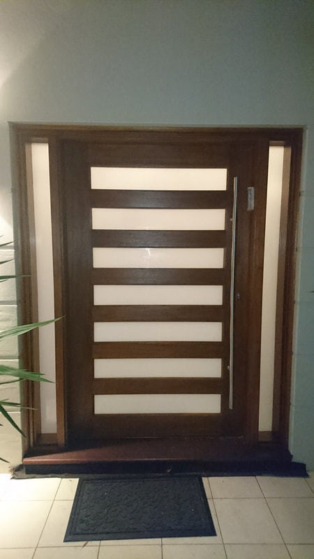 Brown Wooden door with glass design