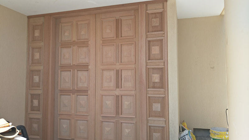 Wooden doors with box patterns